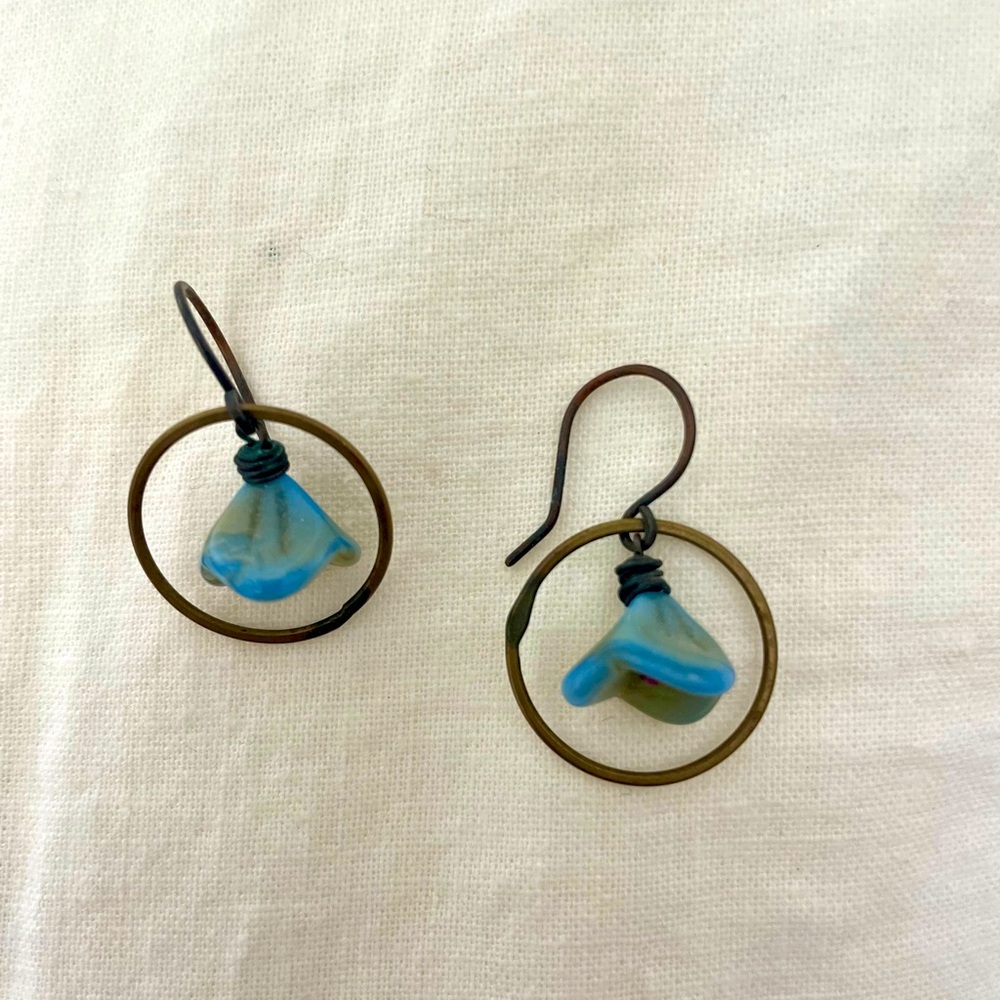 Copper ring earrings with blue flower